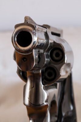 Close-up of a revolver gun barrel.