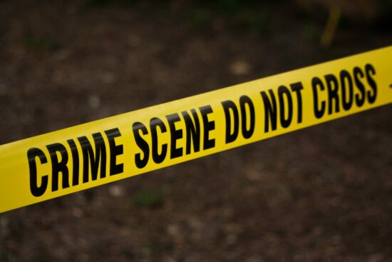 Crime scene tape reading "Do not cross".