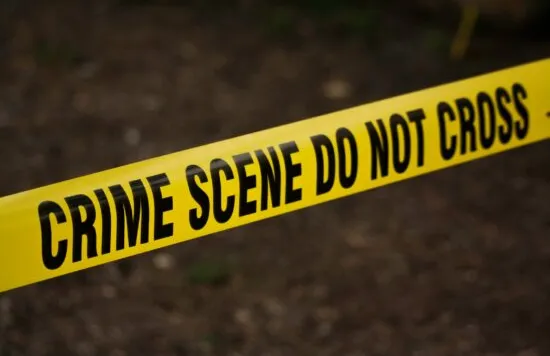 Crime scene tape reading "Do not cross".