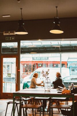 two women in a cafe window