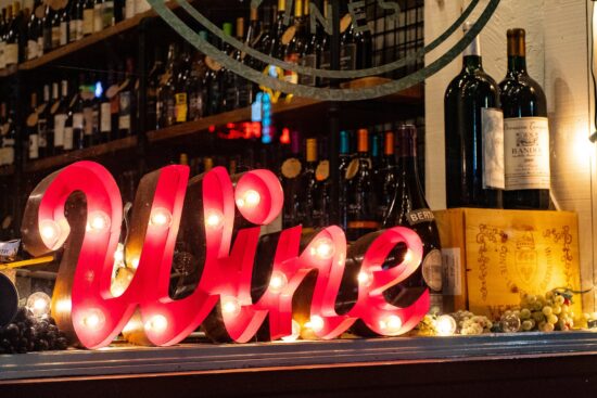 illuminated WINE sign