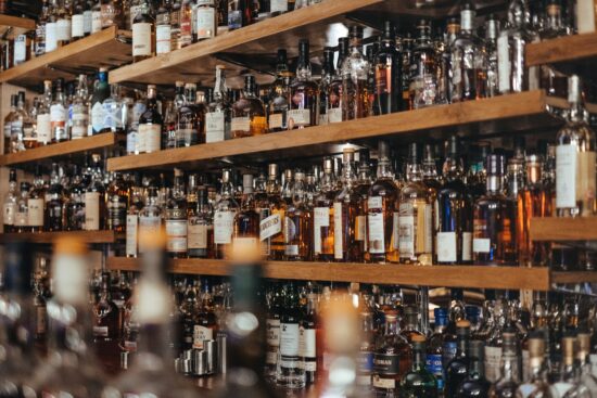 fully stocked whiskey bar