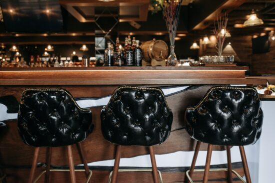 Black Bar Stools at Bar