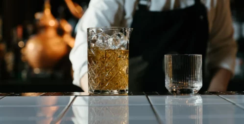 Bartender serving alcohol