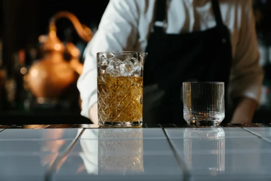 Bartender serving alcohol